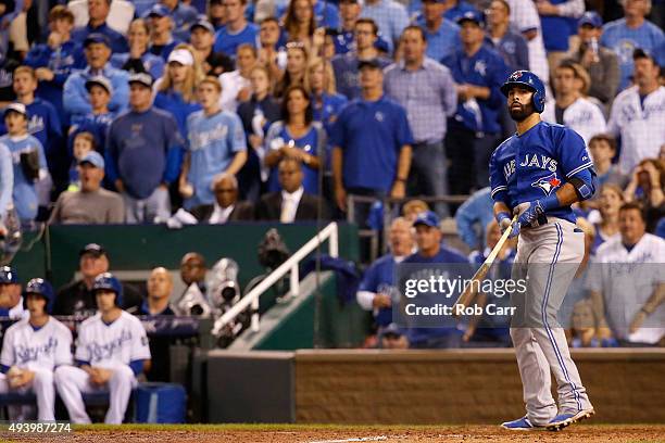 Jose Bautista of the Toronto Blue Jays hits a two-run home run in the eighth inning against the Kansas City Royals in game six of the 2015 MLB...