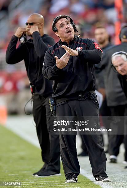 Head coach Jim Tomsula of the San Francisco 49ers reacts to an officials call against the Seattle Seahawks during the first quarter of an NFL...