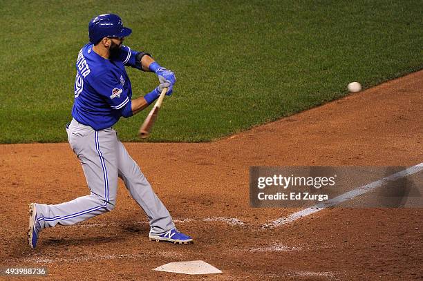 Jose Bautista of the Toronto Blue Jays hits a two-run home run in the eighth inning against the Kansas City Royals in game six of the 2015 MLB...