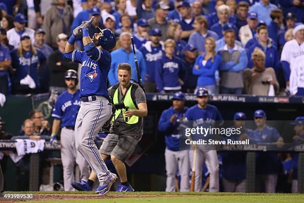 Jose Bautista hits a two run homer. The Toronto Blue Jays and the Kansas City Royals play game six of the MLB American League Championship Series at...