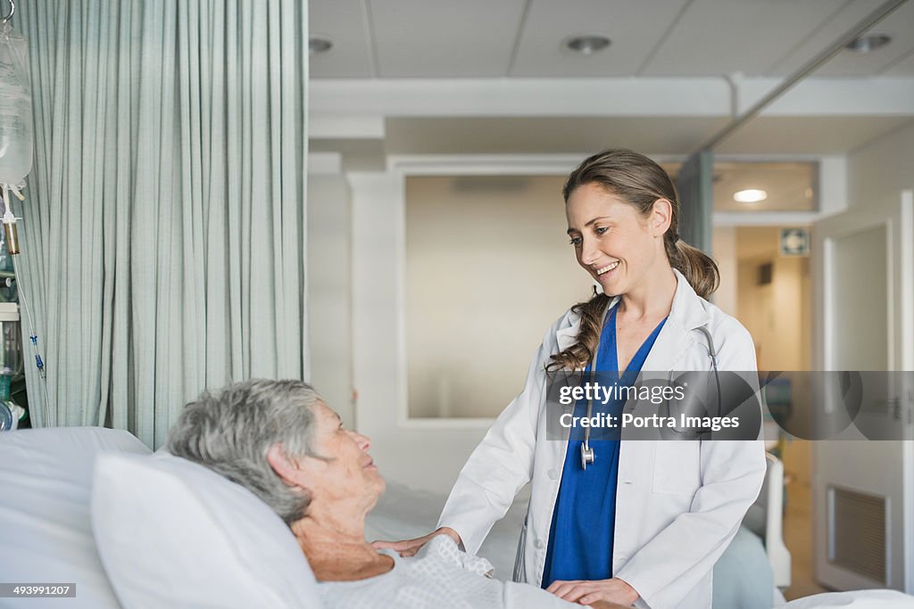 Doctor checking on a patient