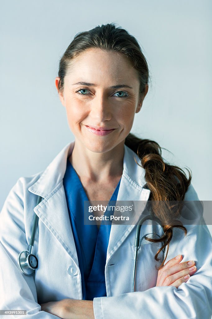 Female doctor with a happy face.