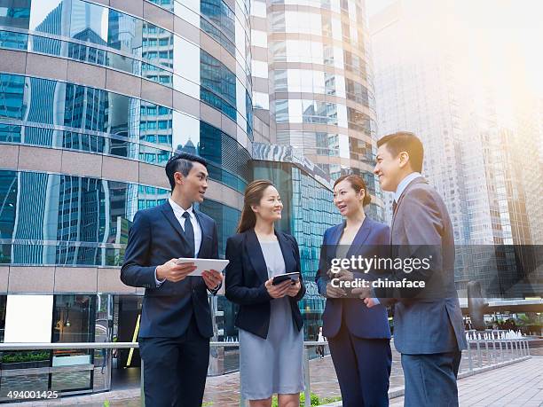 chinese business team - business chinese men talking stockfoto's en -beelden