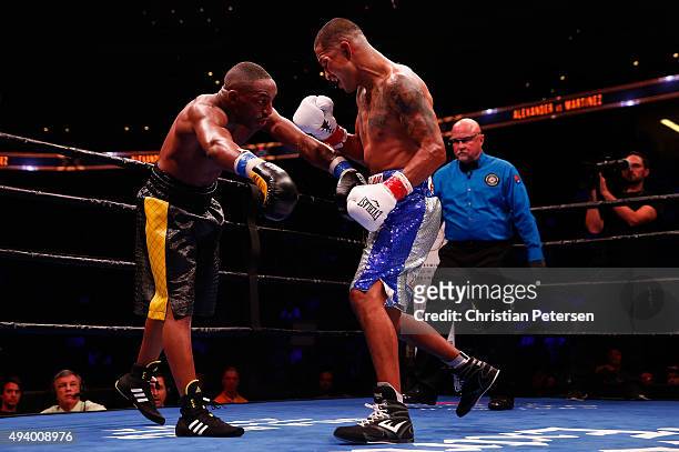 Aron Martinez and Devon Alexander fight during the main event welterweight bout at Gila River Arena on October 14, 2015 in Glendale, Arizona.