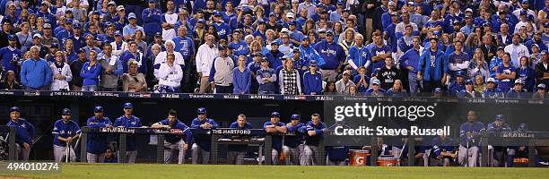 The Jays line up on the dugout with one out in the ninth. The Toronto Blue Jays and the Kansas City Royals play game six of the MLB American League...