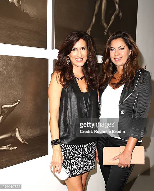 Ritsa Panagis and Steffie Rogotis attend "Metallic Life" by Brian Bowen Smith, brough to you by CASAMIGOS Tequila at De Re Gallery on October 22,...