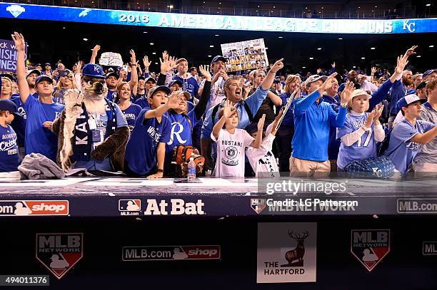 Kansas City Royals fans celebrates after winning Game 6 of the ALCS against the Toronto Blue Jays at Kauffman Stadium on Friday, October 23, 2015 in...