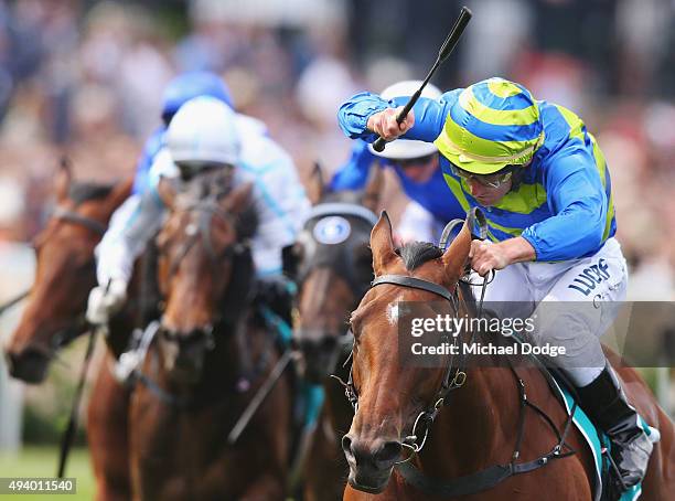 Damien Oliver riding Jameka wins race 7 The Dilmah Exceptional Teas Vase during Cox Plate Day at Moonee Valley Racecourse on October 24, 2015 in...