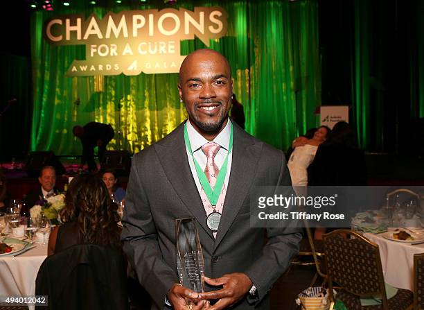 Player Jimmy Rollins accepts the Jane Wyman Humanitarian award at the 2015 Champions For A Cure Awards at the Hyatt Regency Century Plaza on October...