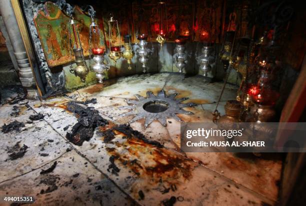 The Grotto, at the Church of the Nativity, believed to be the birthplace of Jesus Christ, is seen on May 27, 2014 after fire broke out just hours...