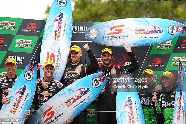 Shane van Gisbergen and Jonathon Webb of the Team TEKNO Darrell Lea Holden celebrate winning with David Reynolds and Dean Canto the The Bottle-O...
