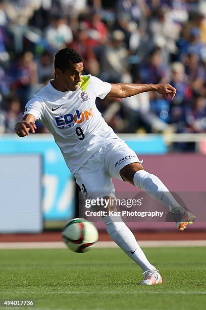 Douglas of Sanfrecce Hiroshima scores his team's first goal during the J.League match between Ventforet Kofu and Sanfrecce Hiroshima at Yamanashi...