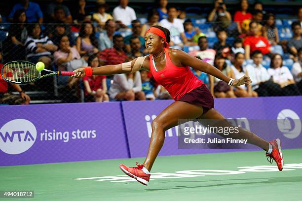 Naomi Osaka of Japan in action against Zhu Lin of China in a round robin match during the WTA Rising Stars Invitational at OCBC Arena on October 24,...