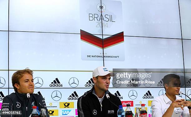 Formula 1 driver Nico Rosberg of Germany, golf professional Martin Kaymer of Germany and DTM driver Pascal Wehrlein of Germany talk to the media...