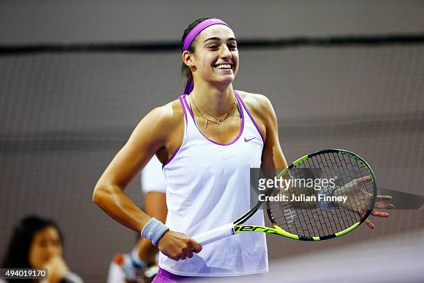 Caroline Garcia of France celebrates her win against Ons Jabeur of Tunisia in a round robin match during the WTA Rising Stars Invitational at OCBC...