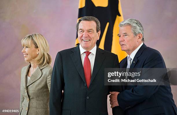 German President Joachim Gauck and his partner Daniela Schadt welcome former German chancellor Gerhard Schroeder and his wife Doris Schroeder-Koepf...