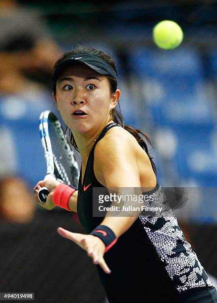 Zhu Lin of China in action against Naomi Osaka of Japan in a round robin match during the WTA Rising Stars Invitational at OCBC Arena on October 24,...