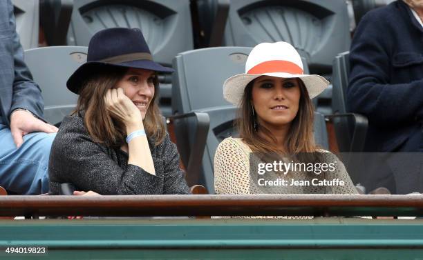 Geraldine Pailhas and Karine Ferri attend the Roland Garros French Tennis Open 2014 - Day 2 on May 26, 2014 in Paris, France.