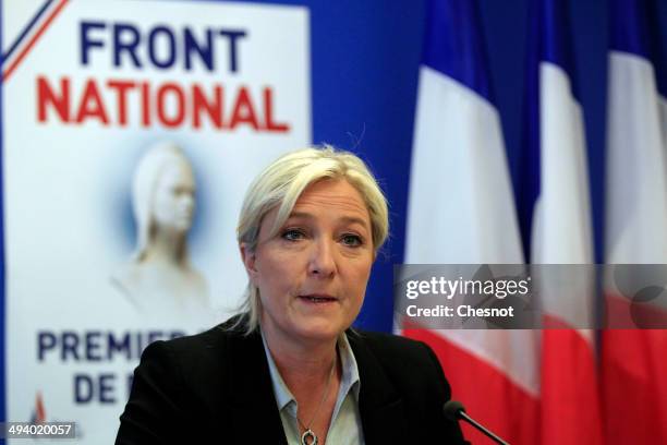 French far-right party National Front president Marine Le Pen delivers a speech during a press conference at the party's headquarters on May 27, 2014...