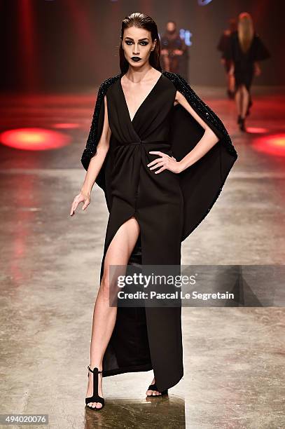 Model walks the runway at the Yousef Al-Jasmi show during Dubai Fashion Forward Spring/Summer 2016 at Madinat Jumeirah on October 23, 2015 in Dubai,...