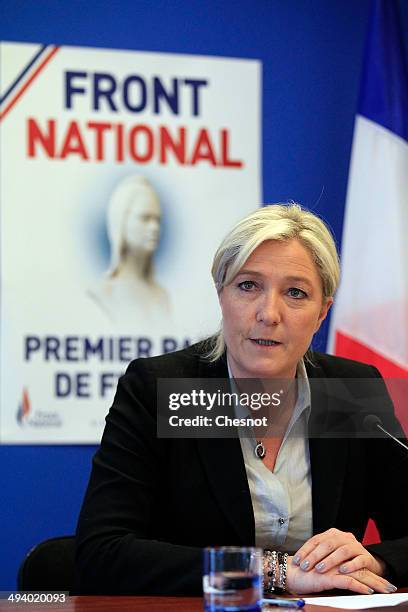 French far-right party National Front president Marine Le Pen delivers a speech during a press conference at the party's headquarters on May 27, 2014...