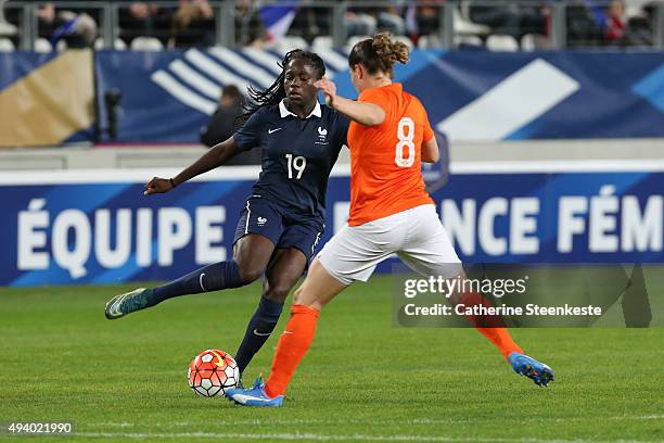 Griedge Mbock Bathy of France controls the ball against Sherida Spitse of Netherlands during the international friendly game between France and...