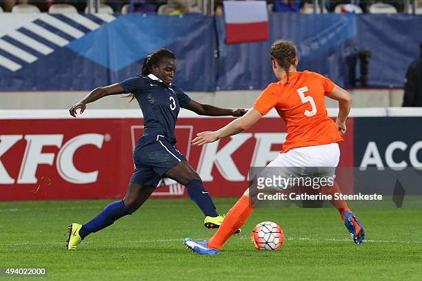 Viviane Asseyi of France tries to control the ball against Dominique Janssen of Netherlands during the international friendly game between France and...