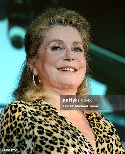 Honoree Catherine Deneuve presents onstage after receiving the... News ...