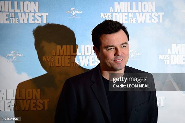 Director and comedian Seth MacFarlane poses for photographers during a photo call for his latest film "A Million Ways To Die In The West" at...