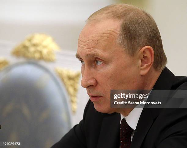Russian President Vladimir Putin speeches during a meeting of the Coordination Council on Implementng the National Children's Strategy for 2012-2014,...