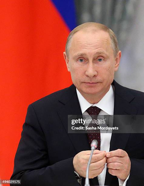 Russian President Vladimir Putin speeches during a meeting of the Coordination Council on Implementng the National Children's Strategy for 2012-2014,...