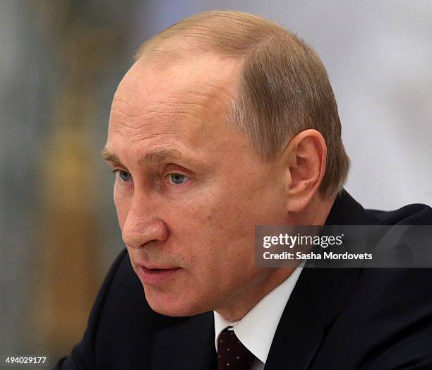 Russian President Vladimir Putin speeches during a meeting of the Coordination Council on Implementng the National Children's Strategy for 2012-2014,...