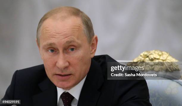 Russian President Vladimir Putin speeches during a meeting of the Coordination Council on Implementng the National Children's Strategy for 2012-2014,...