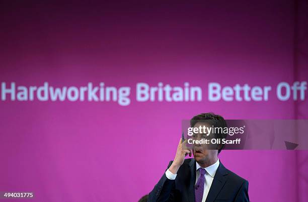 Ed Miliband, the leader of the Labour Party, addresses an audience at 'The Backstage Centre' on May 27, 2014 in Purfleet, England. Mr Miliband spoke...