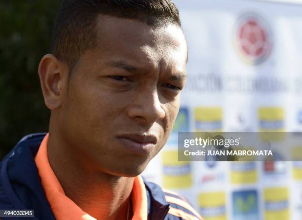 Colombia's midfielder Fredy Guarin talks to journalists after a training session in Los Cardales, some 65 Km north of Buenos Aires, Argentina, on May...