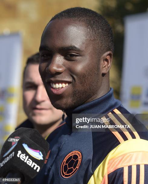 Colombia's defender Eder Alvarez Balanta talks to journalists after a training session in Los Cardales, some 65 Km north of Buenos Aires, Argentina,...