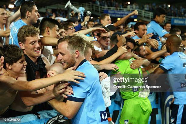 Rhyan Grant of Sydney FC celebrates with fans after winning the round three A-League match between Sydney FC and Western Sydney Wanderers at Allianz...