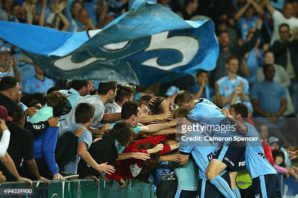Milos Ninkovic of Sydney FC celebrates scoring a goal during the round three A-League match between Sydney FC and Western Sydney Wanderers at Allianz...
