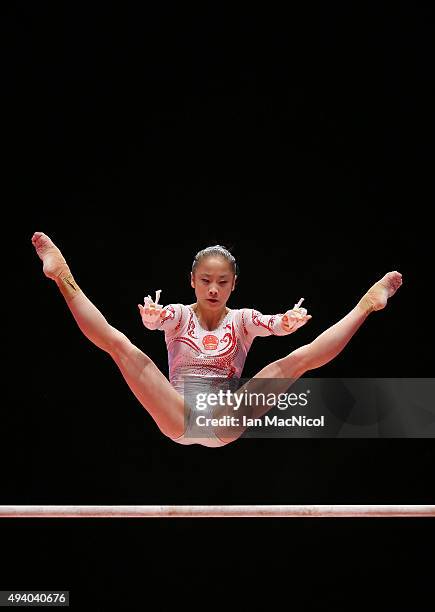 Tan Jiaxin of China competes on the Uneven Bars during day Two of the 2015 World Artistic Gymnastics Championships at The SSE Hydro on October 24,...