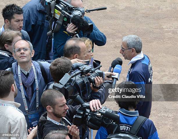 Doctor Enrico Castellacci speaks to the media after a training session at Coverciano on May 27, 2014 in Florence, Italy.