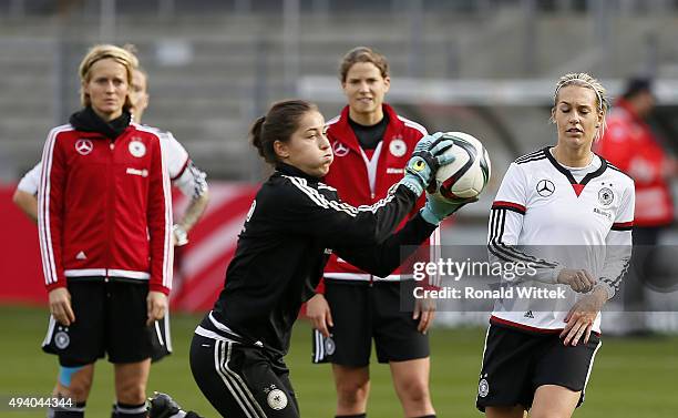 Goalkeeper Lisa Weiss and players of Germany Women's National team during a training session at Hardtwald stadion on October 24, 2015 in Sandhausen,...