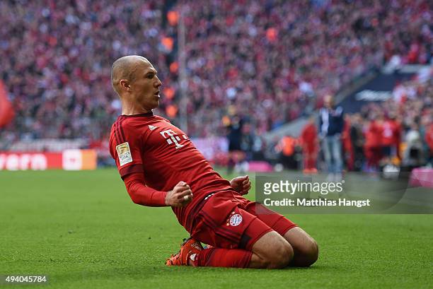 Arjen Robben of Muenchen celebrates after scoring his team's first goal during the Bundesliga match between FC Bayern Muenchen and 1. FC Koeln at...