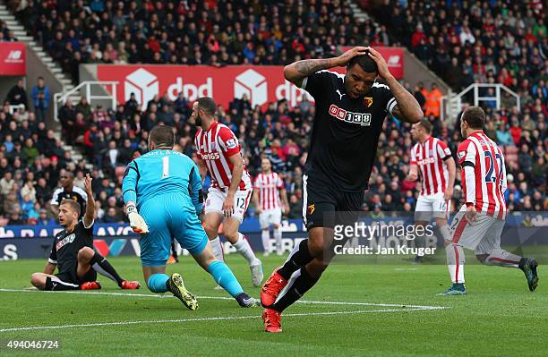 Troy Deeney of Watford reacts after missing a chance during the Barclays Premier League match between Stoke City and Watford at Britannia Stadium on...