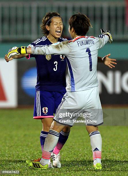 Azusa Iwashimizu#3 and Fukumoto of Japan celebrates after they defeated Australia 1-0 during the AFC Women's Asian Cup Final match between Japan and...