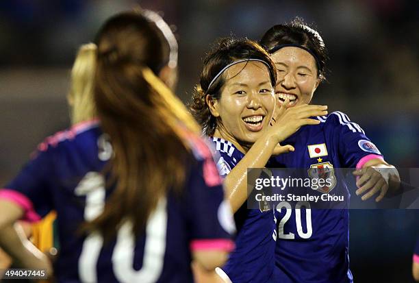 Azusa Iwashimizu of Japan celebrates after scoring the 1st goal against Australia during the AFC Women's Asian Cup Final match between Japan and...