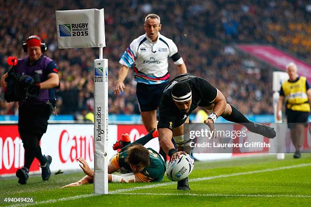 Jerome Kaino of the New Zealand All Blacks scores the opening try during the 2015 Rugby World Cup Semi Final match between South Africa and New...