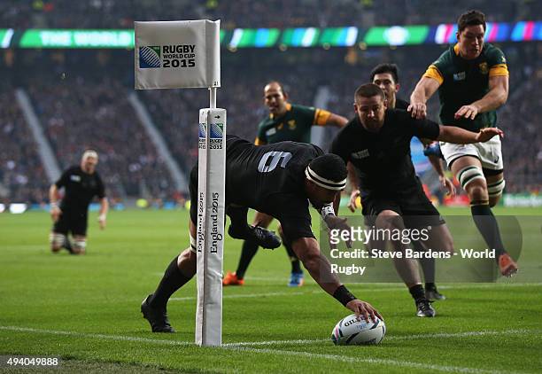 Jerome Kaino of the New Zealand All Blacks scores the opening try during the 2015 Rugby World Cup Semi Final match between South Africa and New...