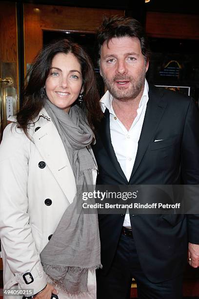 Actors Cristiana Reali and Philippe Lellouche attend the 'Mugler Follies' 100th Edition at Le Comedia in Paris on May 26, 2014 in Paris, France.