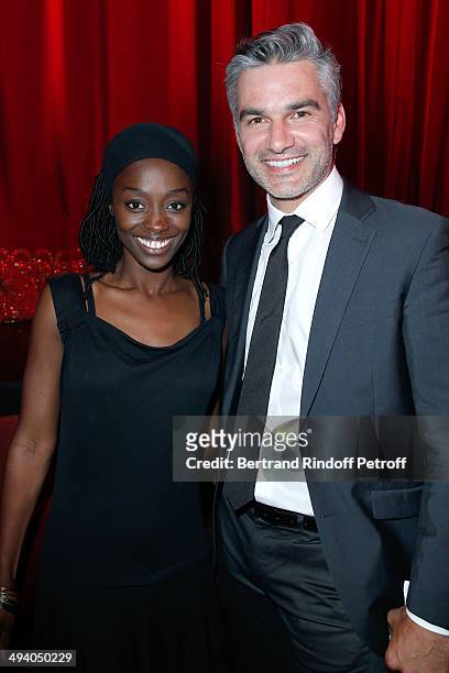 Actors Aissa Maiga and Francois Vincentelli attend the 'Mugler Follies' 100th Edition at Le Comedia in Paris on May 26, 2014 in Paris, France.