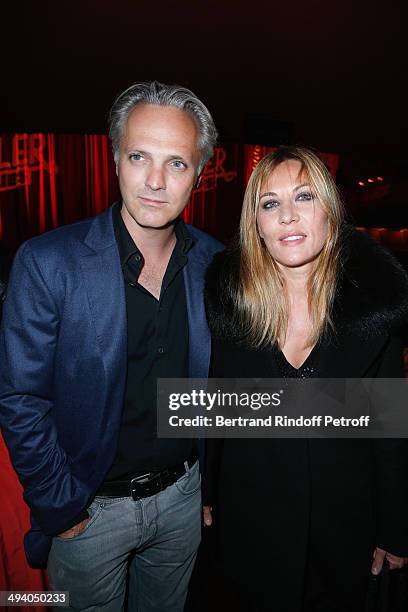 Actress Mathilde Seigner with her companion Mathieu Petit attend the 'Mugler Follies' 100th Edition at Le Comedia in Paris on May 26, 2014 in Paris,...